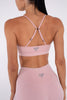 pink cross back sports bra